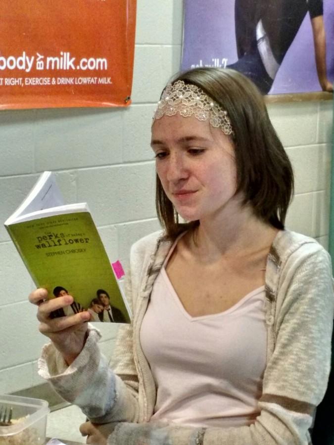 Carly Lance (10) enjoys reading The Perks of  Being a Wallflower at lunch.