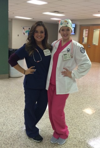 Taylor Henry (12) and Danielle Bowman (12) as Meredith Grey and Addison Shepherd from Grey's Anatomy.