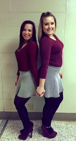 Lindsay Gray (12) and Alyssa Hendrickson (12) wearing matching outfits. 