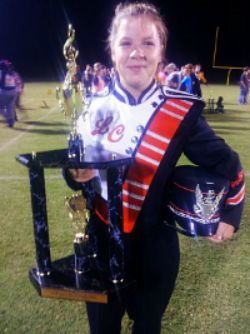 Ashtun Fitzpatrick (12) poses with the trophy received at Karns. 