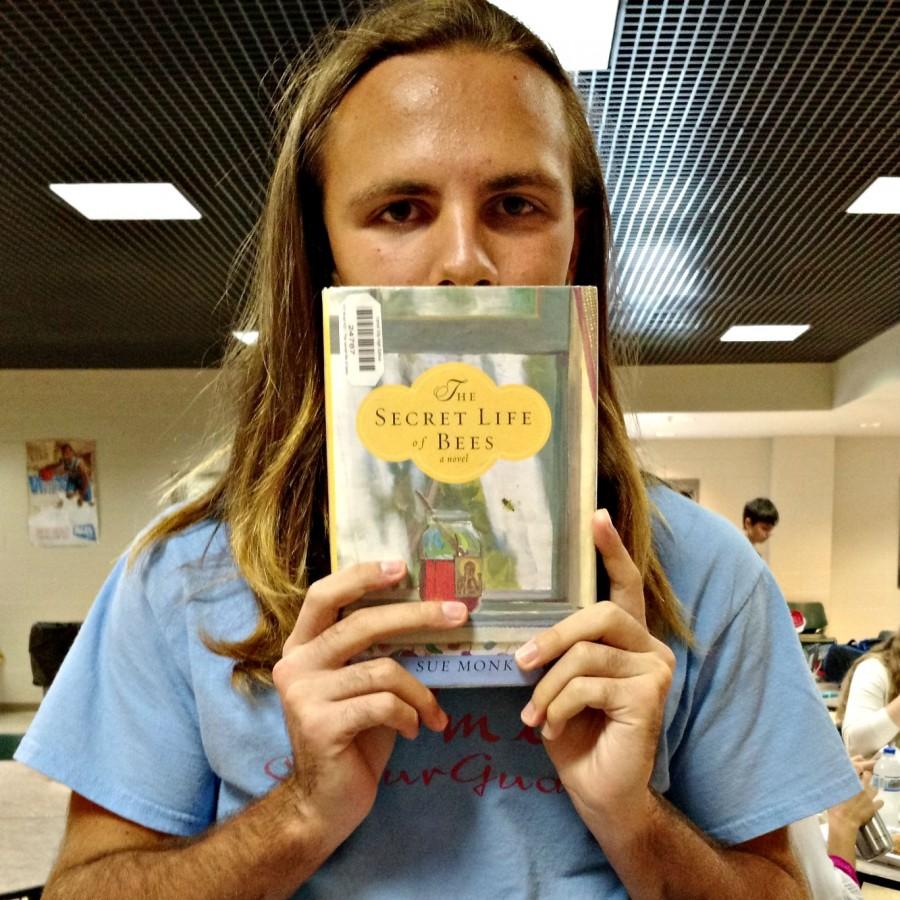 Harley White (12) shows off the librarys  The Secret Life of Bees.