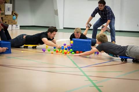 Andy Thornton (12), Eric Hall (11), Trevor Good (11), and Philip Sparks (10) play Hungry Hungry Hippos.