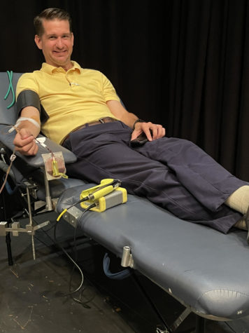 Mr. Daniel Browning donating blood for the Medic Blood Drive