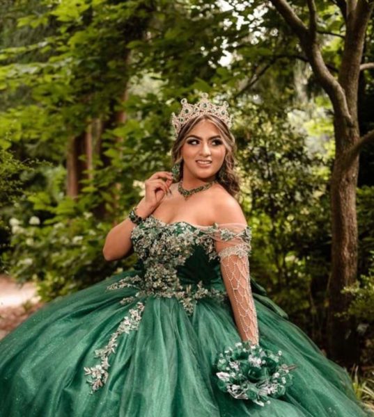 Sherlin Morales (11) poses for a photo at her Quinceañera.
