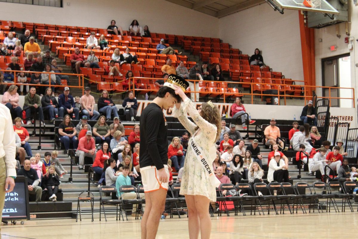 Matthias Witte (12) being crowned at the homecoming game
