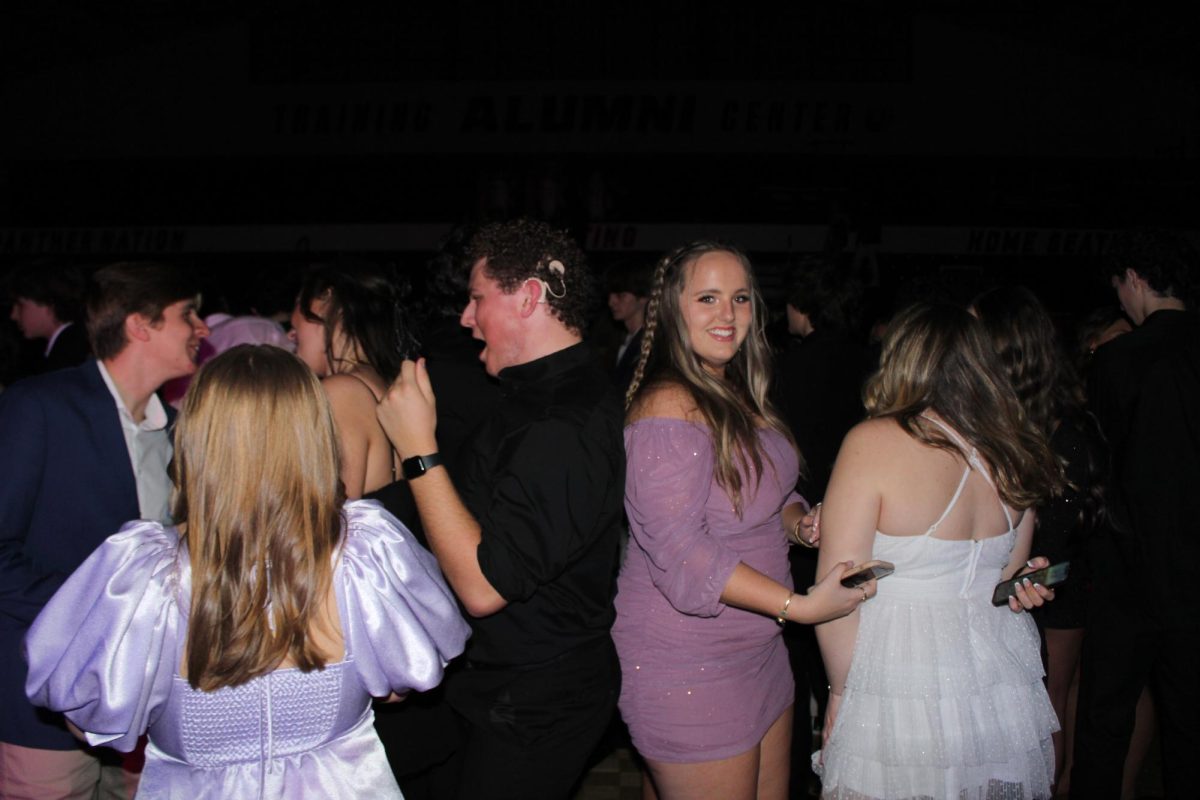 Eli Park and Ava Waugh (12) dance the night away.