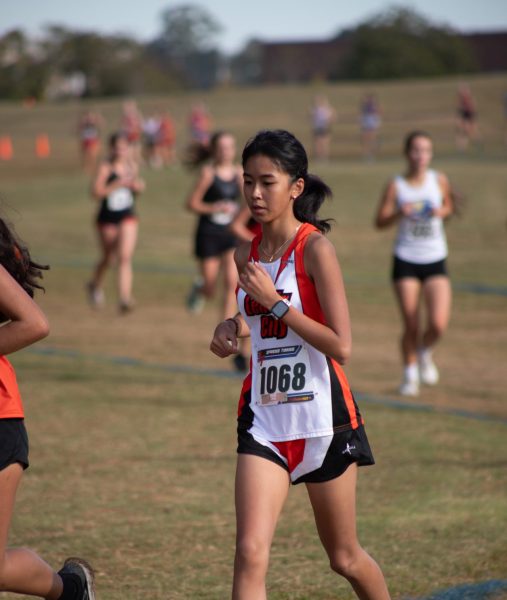 Cindy Van Tran (11) runs a PR at a meet in Alabama